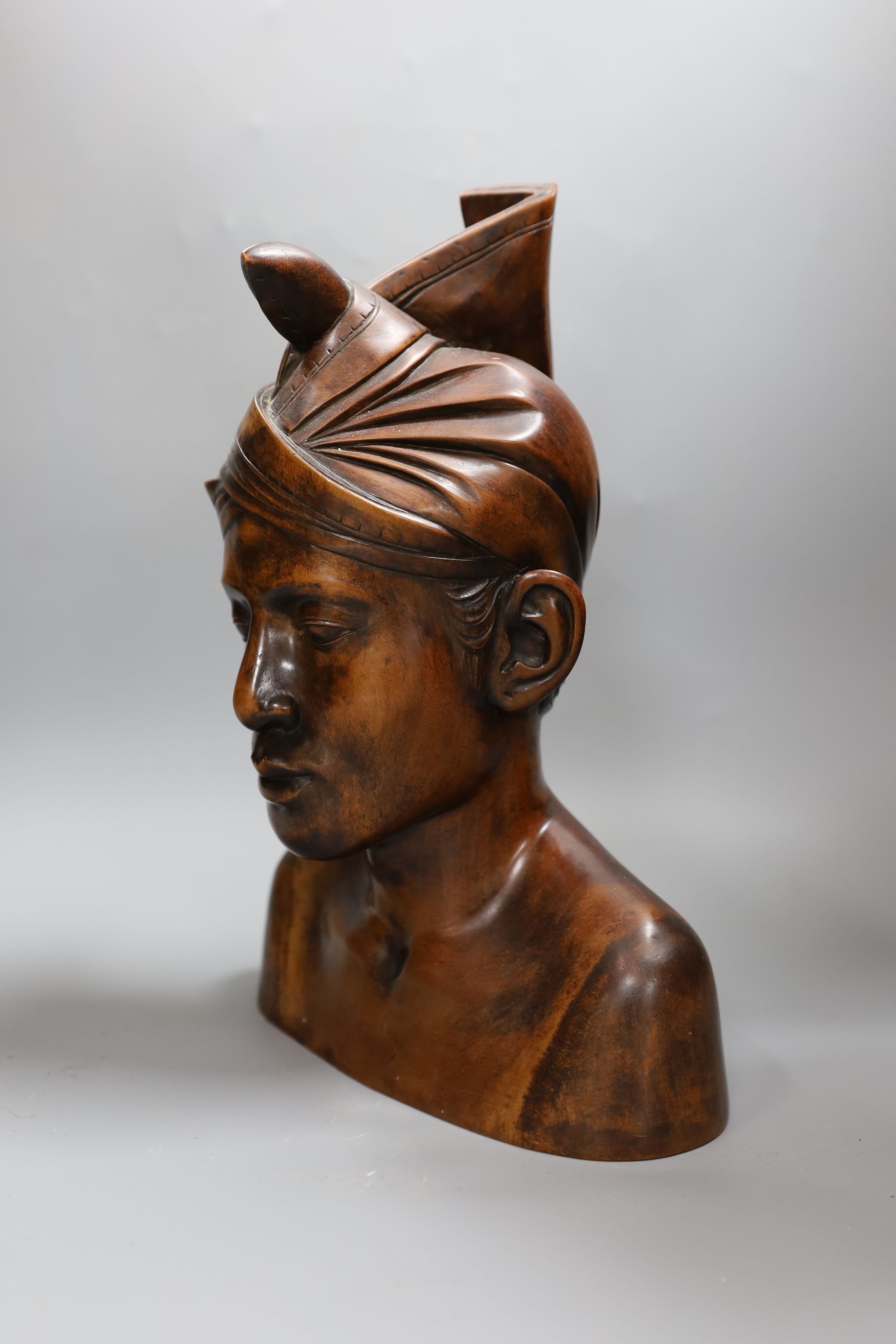 A carved wood bust 33cm